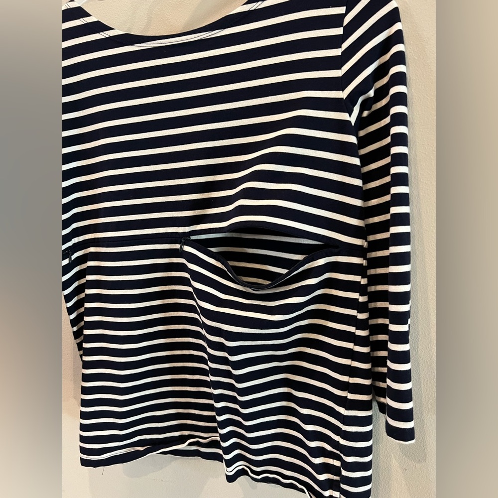 Nursing queen 3/4 length sleeve top with hidden zippers for nursing.